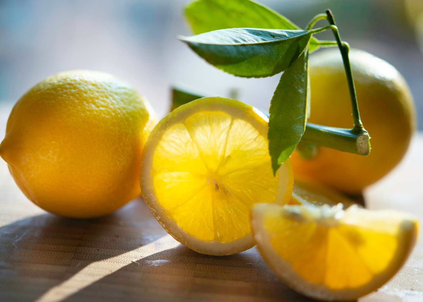 Yellow lemon on a brown wooden table